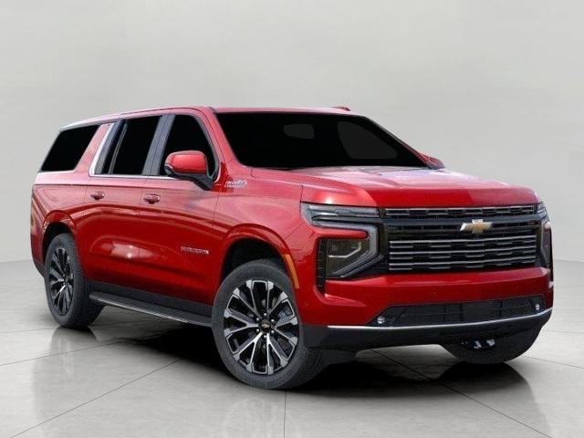 2026 Chevrolet Suburban 4WD 4dr High Country in Radiant Red Tintcoat — front three-quarter view